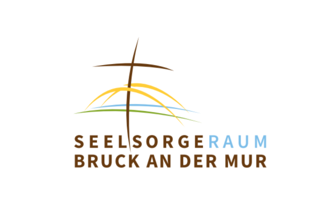 Im Mittelpunkt steht das Kreuz. Die gelben Bögen symbolisieren Brücken für Verbindung, Dialog und Aufbruch. Blau und Grün verweisen auf die Verbundenheit mit der Schöpfung und stehen für die Mur und die umliegende Berglandschaft.