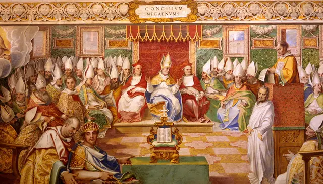 Kaiser Konstantin eröffnet die Versammlung der Bischöfe in Nicäa und deutet auf das in der Mitte aufgestellte Schriftstück, Symbol für die im Konzil erkannten Glaubenswahrheiten. Das Gemälde von Cesare Nebbia (1536–1614) befindet sich in der Vatikanischen Bibliothek.  | Foto: Wikimedia
